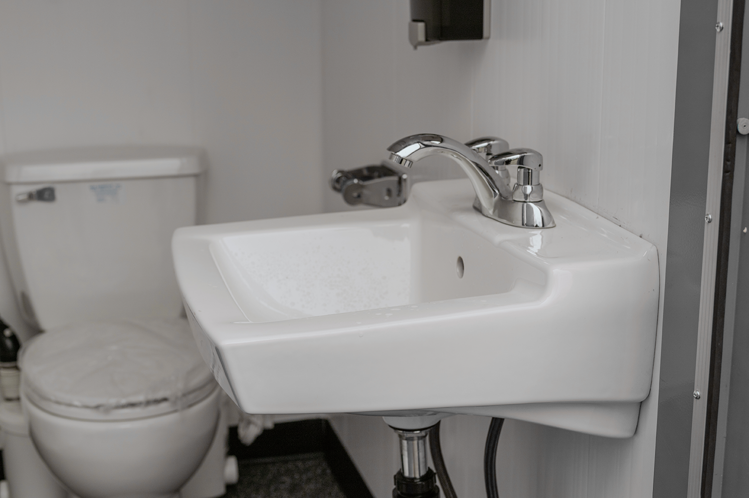 Sink and running water for hygienic hand sanitizing station