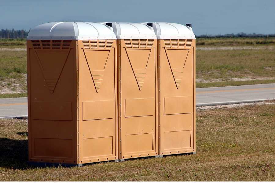 portable outhouses with no running water or ability to flush